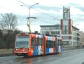 Astra č. 310 s novou reklamou před slovanskou radnicí na Koterovské třídě 18. 2. 2006