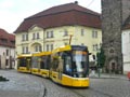 40T č. 393 projíždí Pražskou ulicí 2. 6. 2024