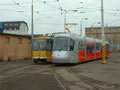 Tramvaj Škoda 14T najíždí na tzv. šrotovací kolej, která je bez trolejového vedení a kde bude naložena na návěs - 10. 12. 2005