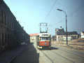 Vůz T2 č. 159 na staré Přemyslově třídě, kde probíhají demolice domů z důvodu přípravy stavby silničního průtahu 2. 5. 1986 Foto: J. Hertl, archiv Jiřího Hertla (SPVD)