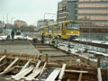 Souprava T3P 254+255 projíždí kolem právě betonovaného mostu U Jána 20. 11. 2005