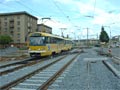 Souprava T3M č. 209+210 vyjíždí po novém kolejišti na Slovanské aleji 28. 5. 2006