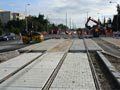 Rekonstrukce kolejiště v křižovatce u zastávky Sokolovská - zákryt první poloviny nového přejezdu 10. 8. 2011
