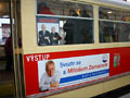 Magnetická fólie na boku historické tramvaje při objednané jízdě 21. 11. 2012